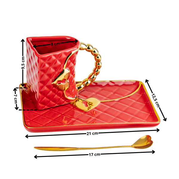 Muki ”Käsilaukku” lautasella ja sydämenmuotoisella lusikalla